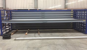 Horizontal storage for loading and unloading sheet metal on seperate sided